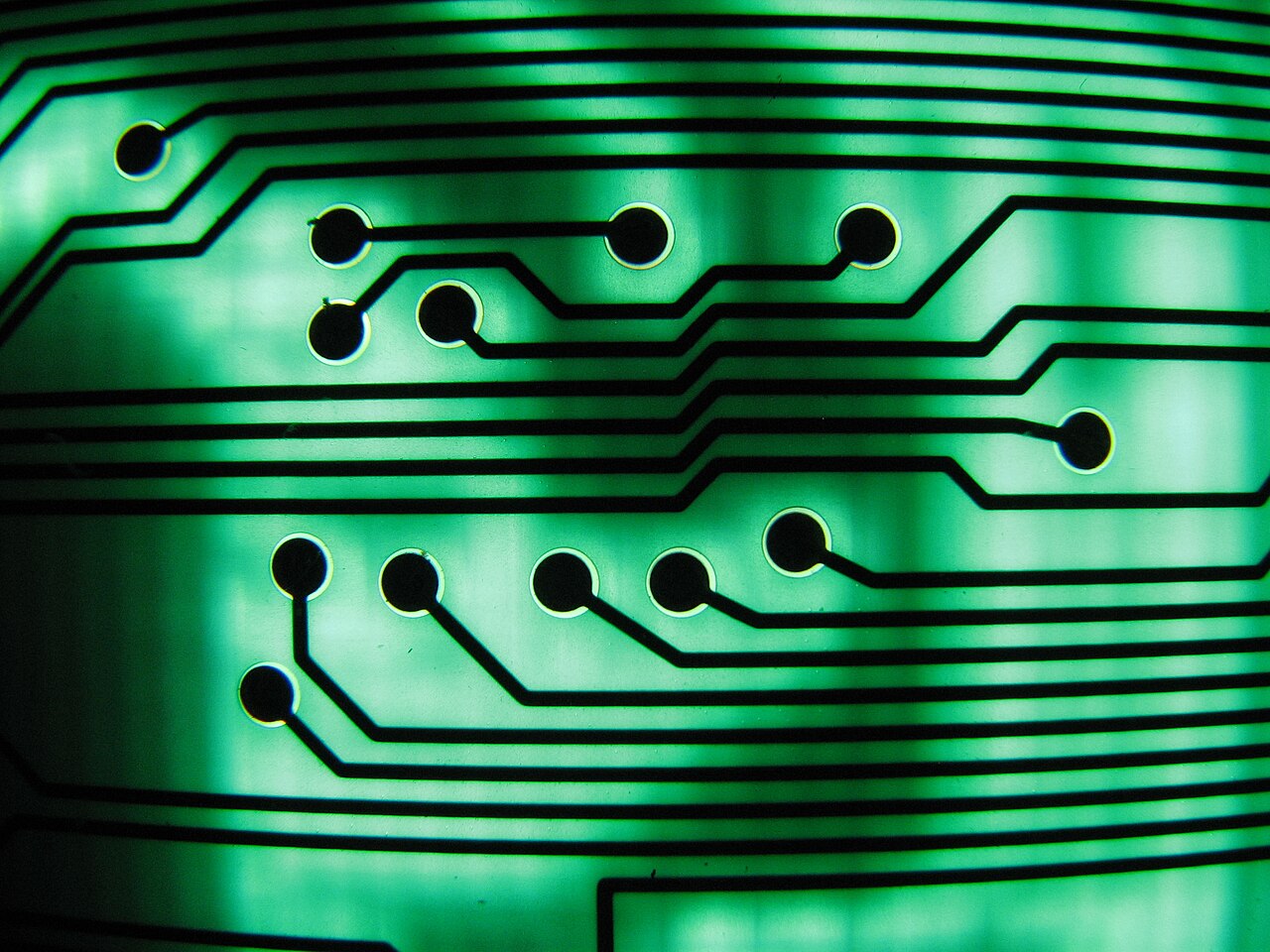 A detailed circuit board, standing in for the careful checking of each part of a procedure